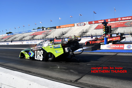 Tim Wilkerson (near lane) vs Cruz Pedregon 
(far lane)